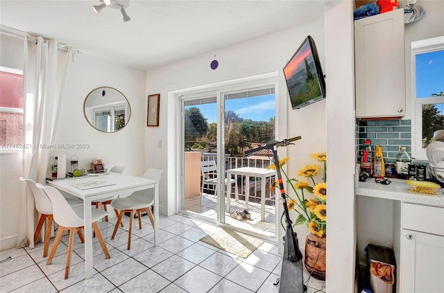 view of tiled dining space