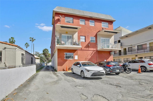 view of property with a balcony