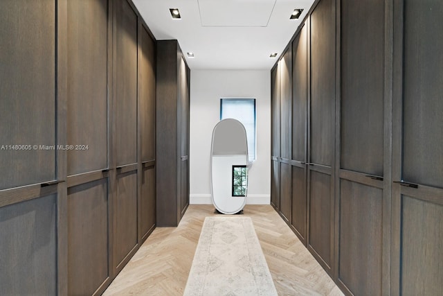 corridor with light parquet floors