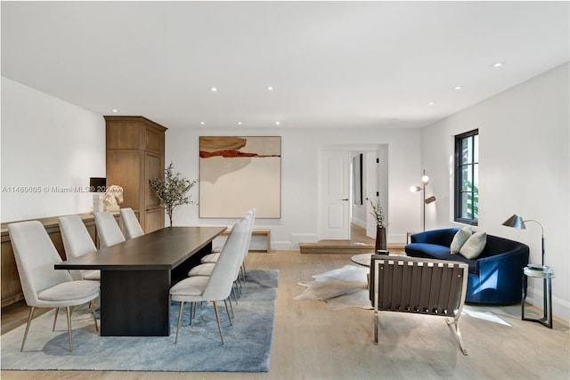 dining area with light wood-type flooring