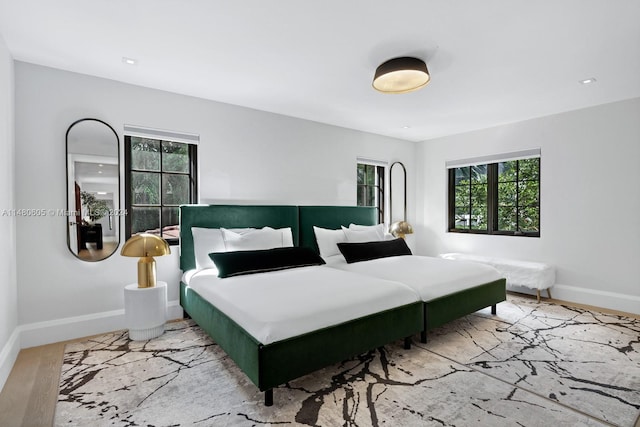 bedroom featuring light hardwood / wood-style floors