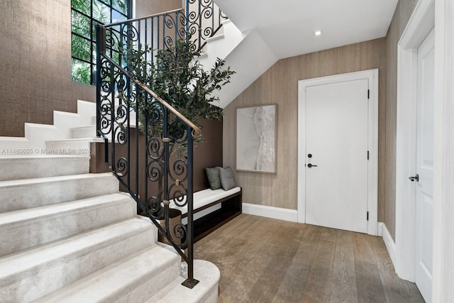 foyer entrance with wood-type flooring