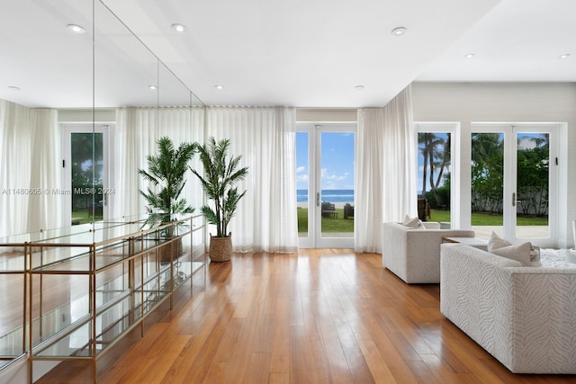 living room with light hardwood / wood-style floors