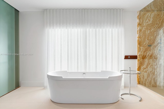 bathroom with tile patterned flooring