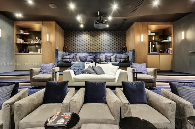 cinema room with built in shelves