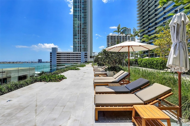 view of patio / terrace with a water view