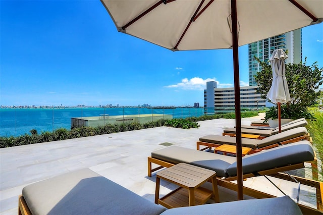 view of patio featuring a water view