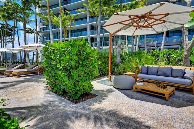 view of terrace featuring a balcony and outdoor lounge area