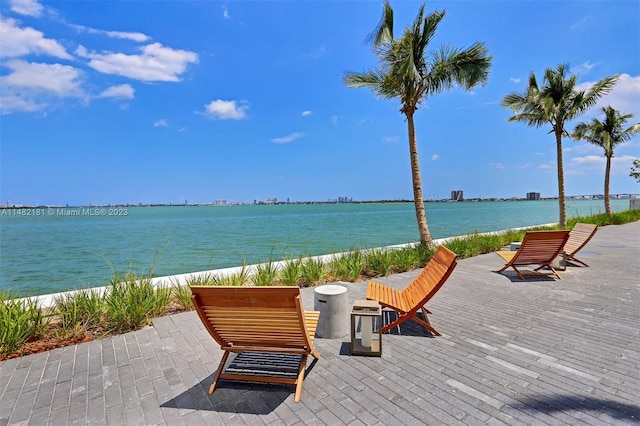 view of patio / terrace with a water view