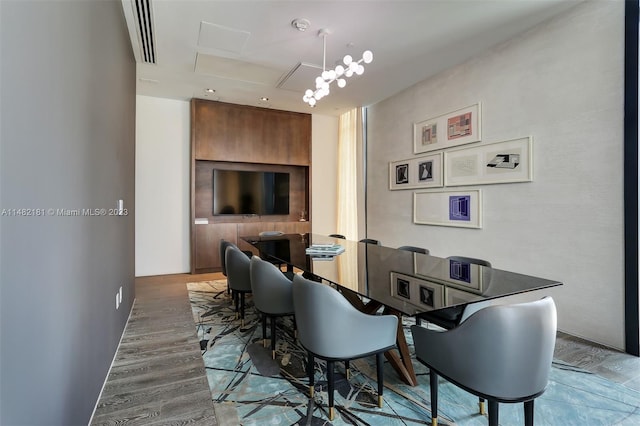 dining area with a notable chandelier