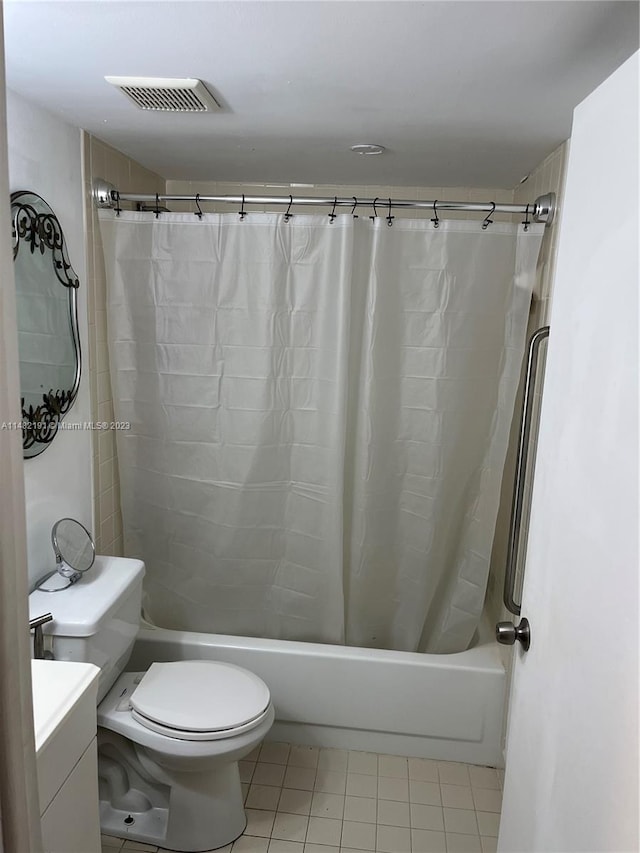 full bathroom featuring tile floors, toilet, vanity, and shower / bathtub combination with curtain