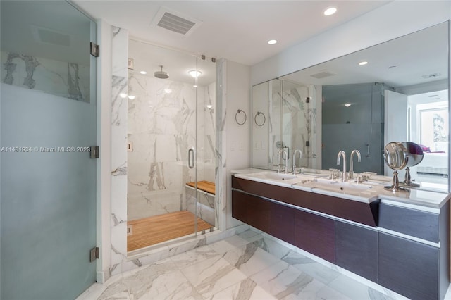 bathroom featuring oversized vanity, tile floors, double sink, and walk in shower