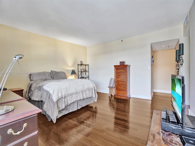 bedroom featuring wood-type flooring