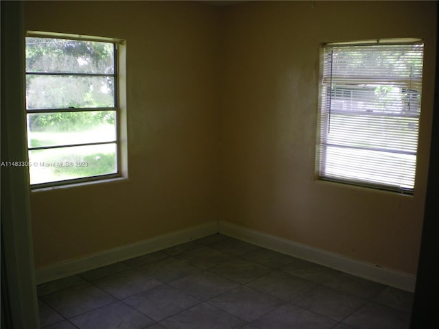 view of tiled spare room