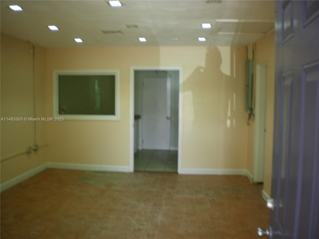 empty room featuring carpet flooring