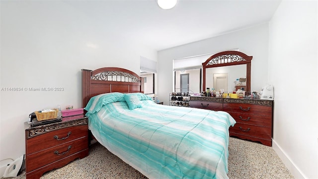 bedroom featuring light colored carpet