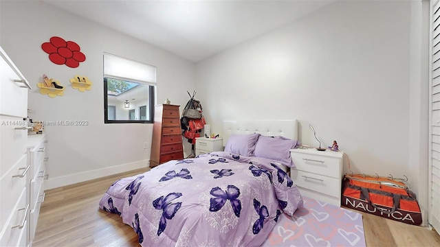 bedroom featuring light wood-type flooring