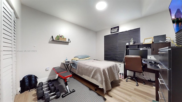 bedroom featuring light wood-type flooring