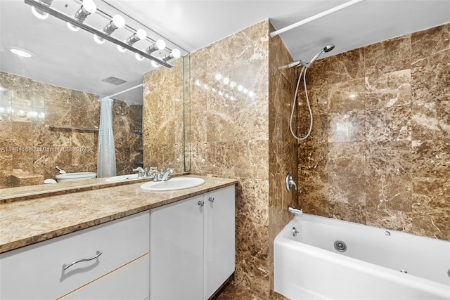 bathroom featuring vanity, tile walls, tile floors, and shower / tub combo with curtain