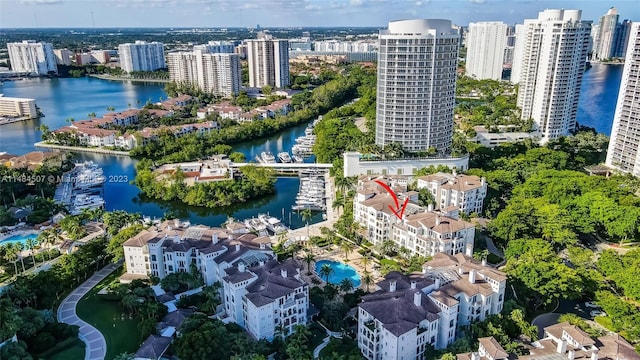 birds eye view of property featuring a water view