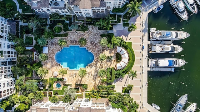 birds eye view of property with a water view