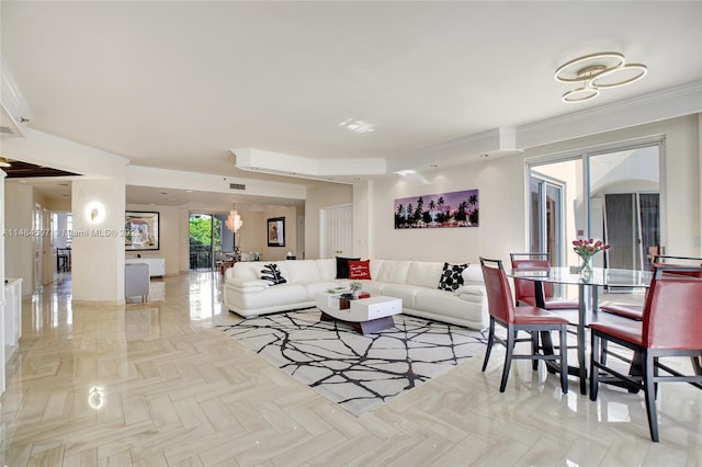 living room featuring crown molding and light parquet floors