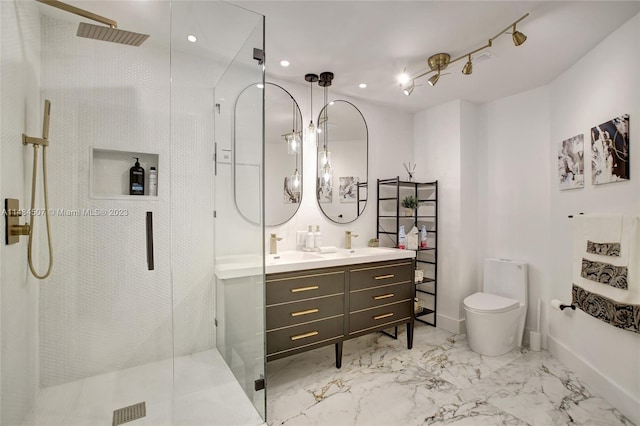 bathroom with oversized vanity, toilet, a shower with shower door, and tile flooring