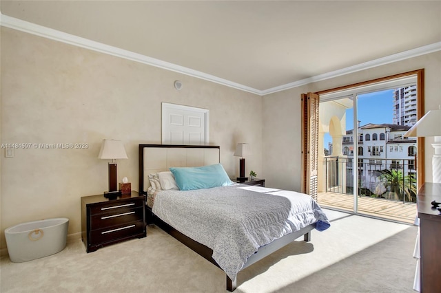 carpeted bedroom featuring crown molding and access to outside