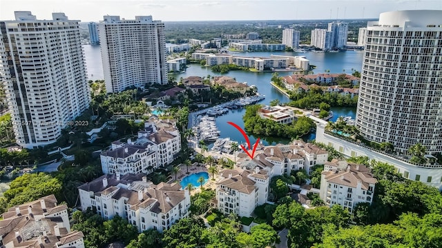 drone / aerial view with a water view