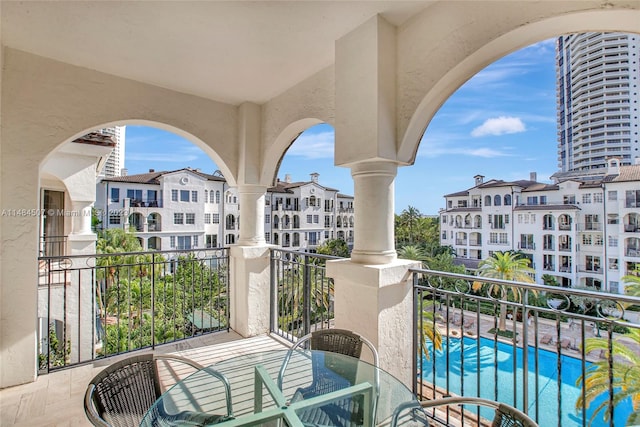 balcony with a community pool