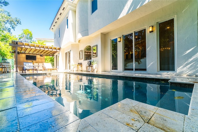 view of swimming pool with a pergola and a patio