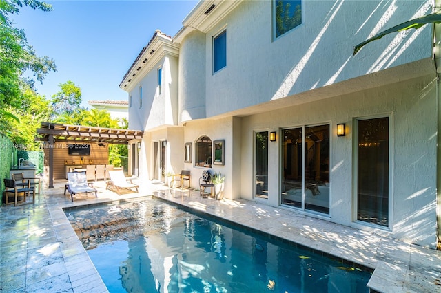 view of swimming pool with a pergola and a patio area