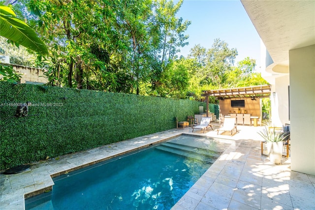 view of swimming pool with a pergola and a patio