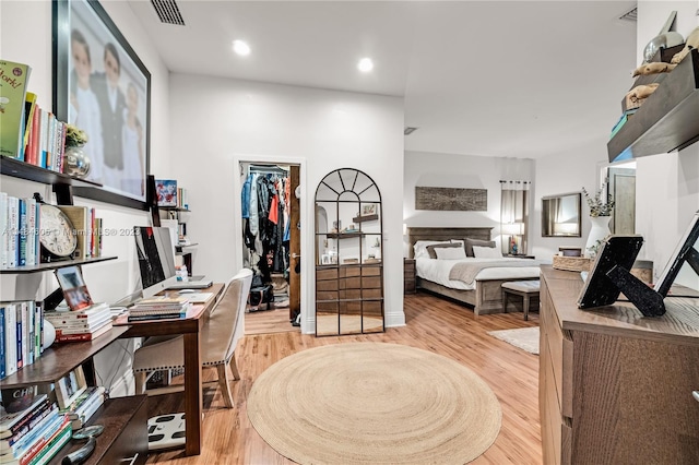 office space with light wood-type flooring