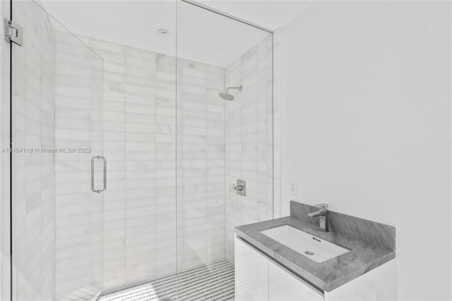 bathroom with sink and walk in shower