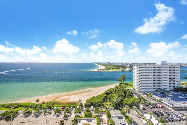 bird's eye view with a beach view and a water view