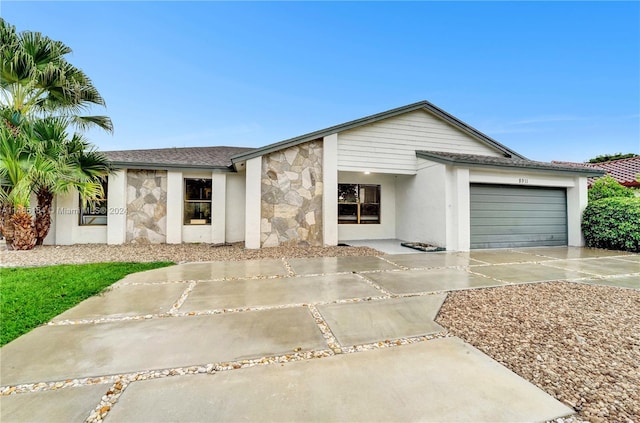 view of front of property featuring a garage