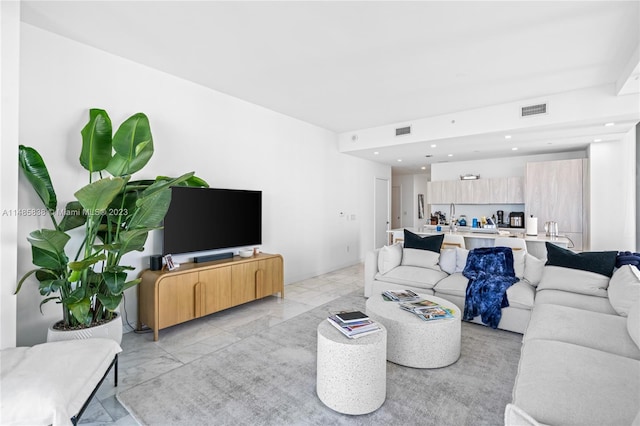 living room with light tile floors