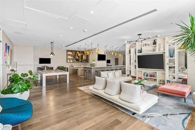 living room with light hardwood / wood-style floors