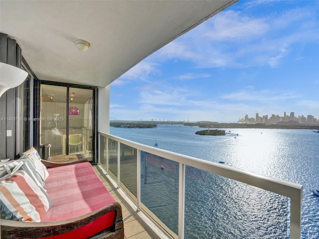 balcony featuring a water view