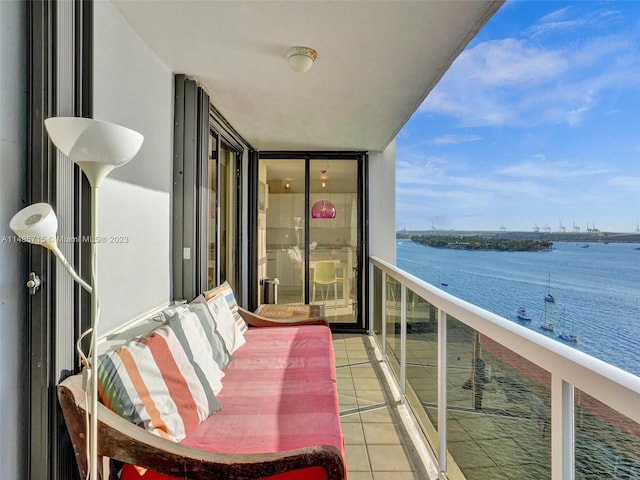 balcony featuring a water view