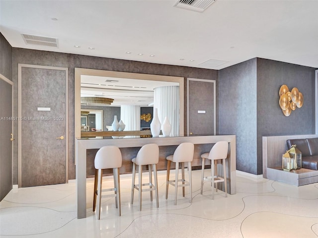 kitchen featuring a breakfast bar area