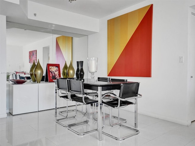 dining room featuring light tile patterned floors