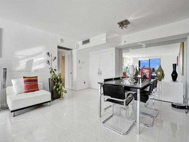 dining room featuring light tile patterned floors