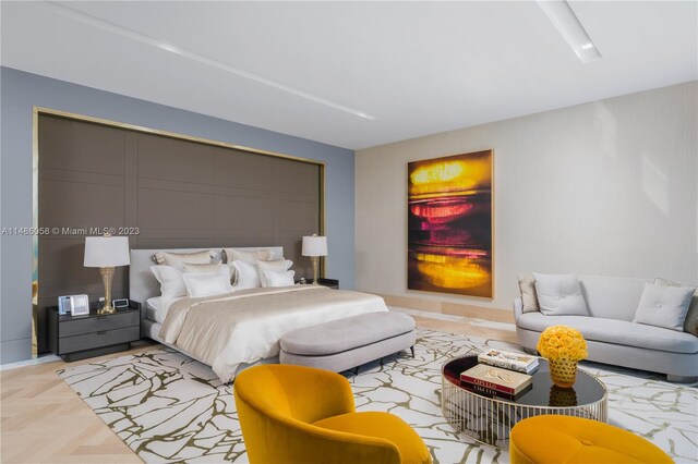 bedroom featuring light parquet floors