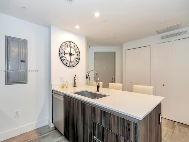 bathroom featuring vanity, hardwood / wood-style floors, and electric panel