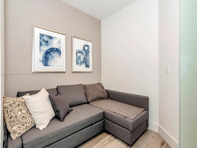 living room with light hardwood / wood-style flooring