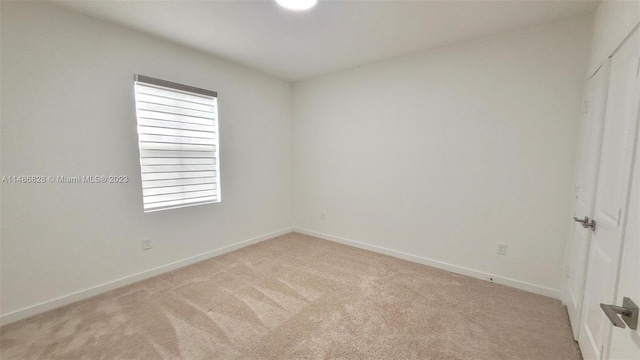 view of carpeted empty room