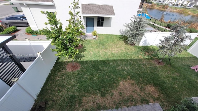 view of yard with a water view