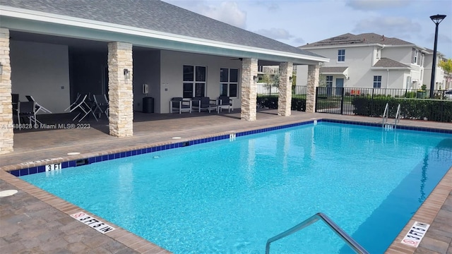 view of pool with a patio